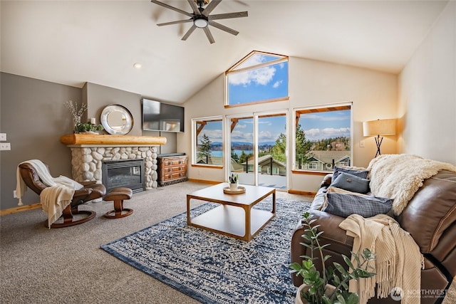 2932 Huntington St, Bellingham, WA 98226 - living area with high vaulted ceiling, ceiling fan, a fireplace, carpet floors, and baseboards