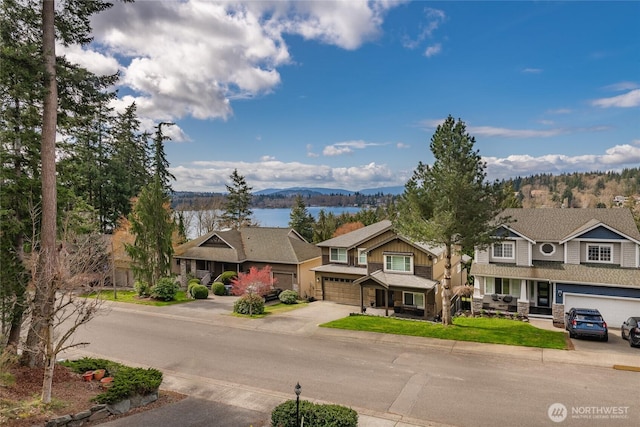 2932 Huntington St, Bellingham, WA 98226 - view of front facade with driveway, a residential view, and a water view