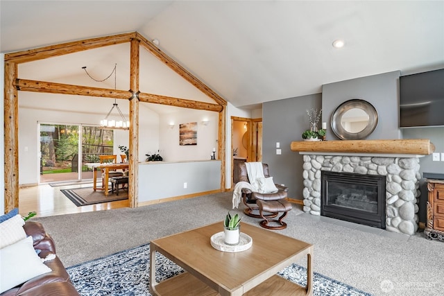 2932 Huntington St, Bellingham, WA 98226 - carpeted living room featuring baseboards, a notable chandelier, a fireplace, and lofted ceiling