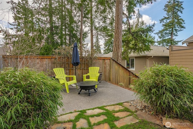2932 Huntington St, Bellingham, WA 98226 - view of patio featuring an outdoor fire pit and fence