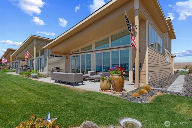 rear view of property with a patio, an outdoor hangout area, and a lawn