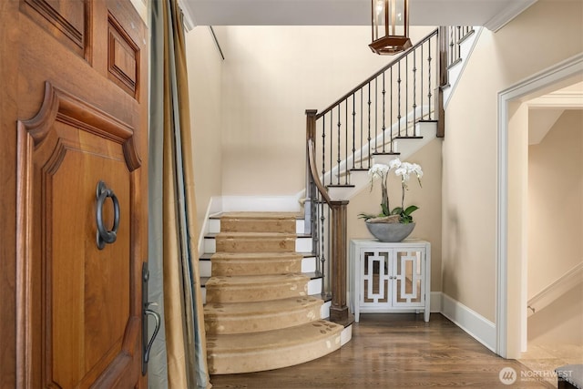 463 39th Ave E, Seattle, WA 98112 - stairway featuring wood finished floors and baseboards