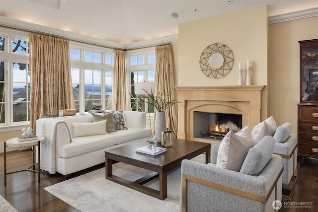 463 39th Ave E, Seattle, WA 98112 - living room featuring dark wood-style floors, a fireplace, and crown molding