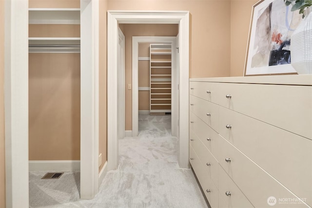 463 39th Ave E, Seattle, WA 98112 - corridor featuring visible vents, baseboards, and light carpet