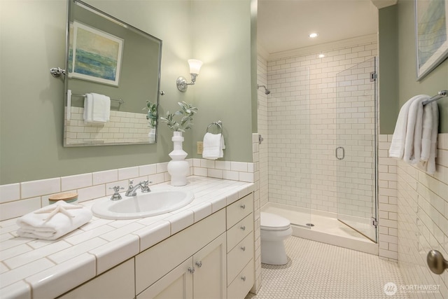 463 39th Ave E, Seattle, WA 98112 - full bathroom featuring recessed lighting, tile patterned floors, toilet, vanity, and a stall shower