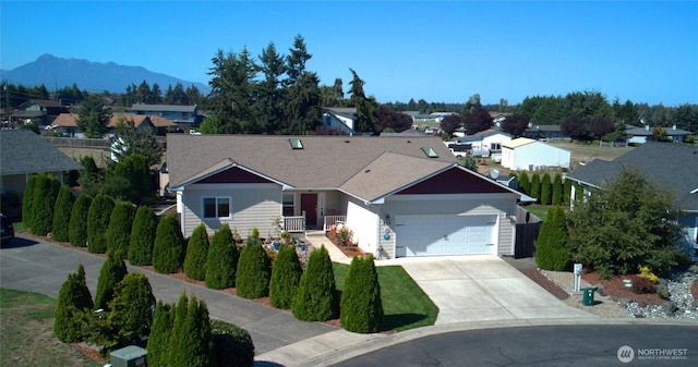 230 Choice Loop, Sequim, WA 98382 - ranch-style house featuring a garage, concrete driveway, and a mountain view