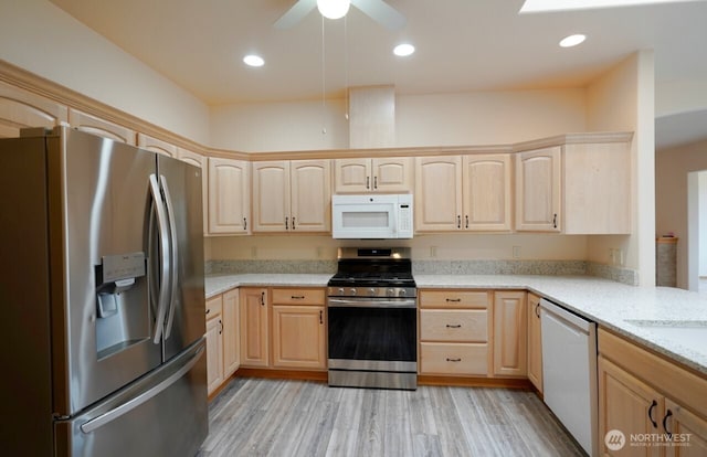 230 Choice Loop, Sequim, WA 98382 - kitchen with stainless steel appliances, light brown cabinets, ceiling fan, light stone countertops, and recessed lighting