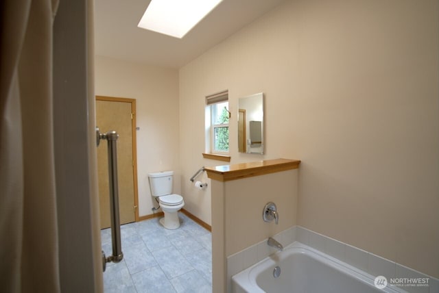 230 Choice Loop, Sequim, WA 98382 - full bath featuring a garden tub, tile patterned flooring, and a skylight