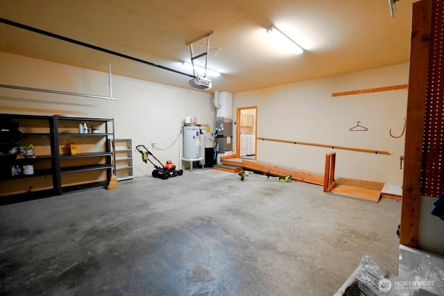 230 Choice Loop, Sequim, WA 98382 - garage with water heater, a garage door opener, and washer / clothes dryer