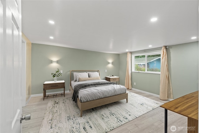 bedroom featuring baseboards, recessed lighting, and light wood-style floors
