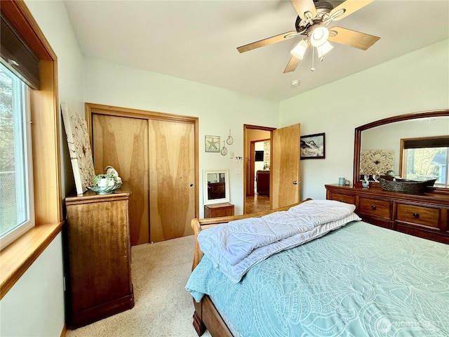 bedroom with a closet and a ceiling fan