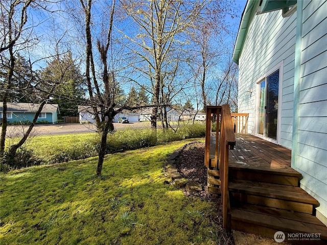 view of yard with a deck