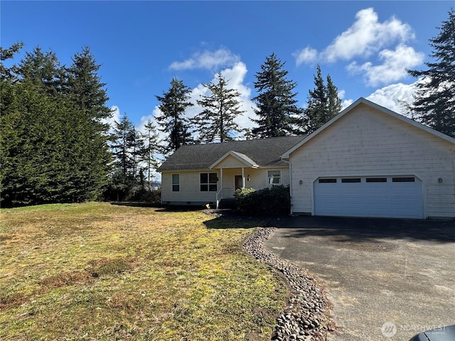 ranch-style house featuring a front lawn, aphalt driveway, and an attached garage