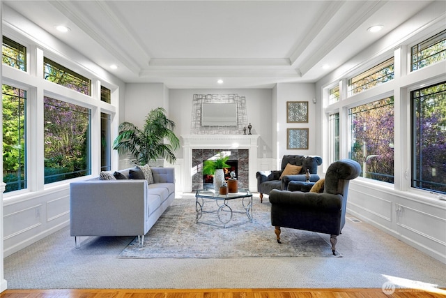 17955 SE 60th St, Bellevue, WA 98006 - living room with a fireplace, a decorative wall, and a raised ceiling
