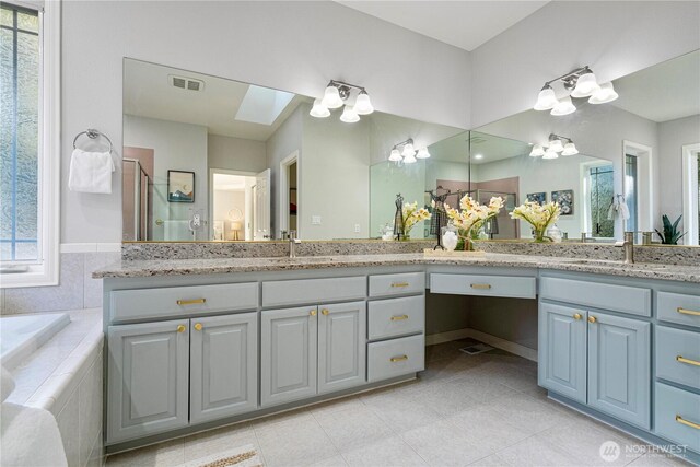 17955 SE 60th St, Bellevue, WA 98006 - bathroom featuring visible vents, tile patterned flooring, vanity, and a garden tub