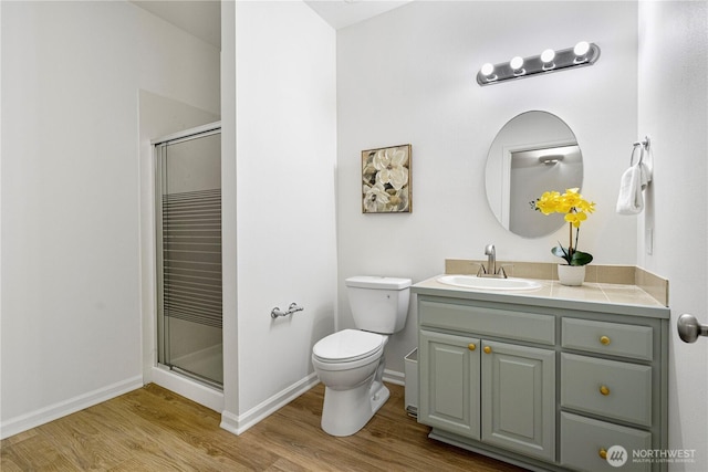 17955 SE 60th St, Bellevue, WA 98006 - bathroom featuring vanity, wood finished floors, toilet, and a shower stall