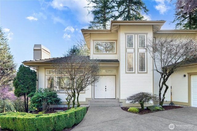 17955 SE 60th St, Bellevue, WA 98006 - view of front facade with a chimney