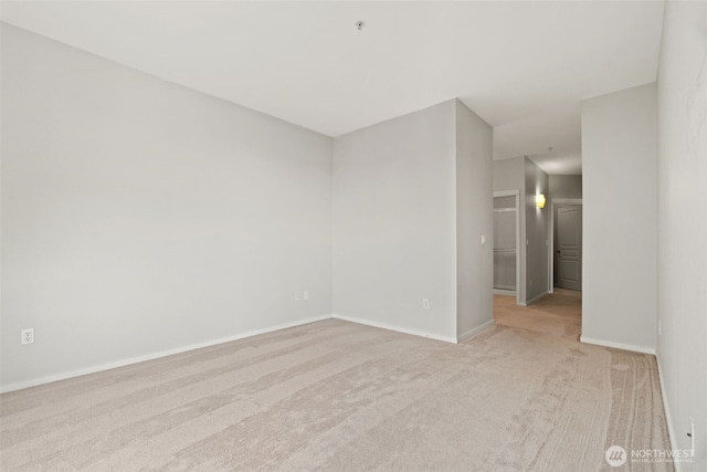 109 2nd St S Unit 337, Kirkland, WA 98033 - empty room with light colored carpet and baseboards