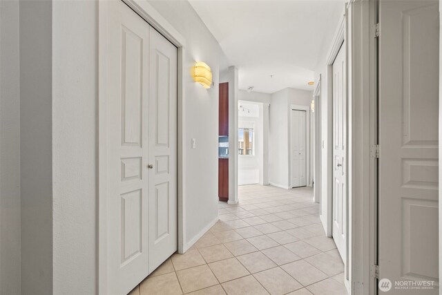 109 2nd St S Unit 337, Kirkland, WA 98033 - corridor featuring light tile patterned floors and baseboards