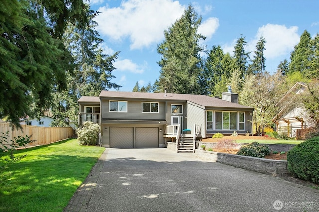 3429 167th Ave SE, Bellevue, WA 98008 - raised ranch featuring an attached garage, driveway, and a chimney