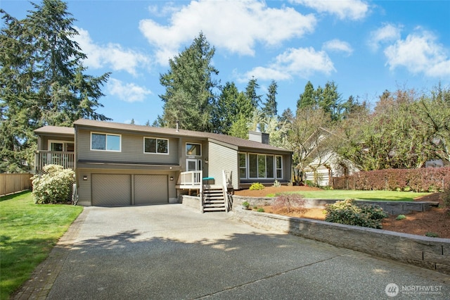 3429 167th Ave SE, Bellevue, WA 98008 - view of front of home featuring asphalt driveway, a garage, a chimney, and a front yard