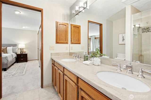 3429 167th Ave SE, Bellevue, WA 98008 - full bathroom featuring toilet, tile patterned floors, double vanity, an enclosed shower, and ensuite bath
