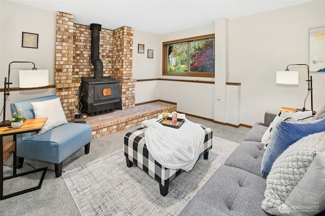 3429 167th Ave SE, Bellevue, WA 98008 - carpeted living room with a wood stove and baseboards