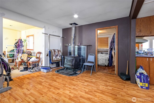 192 Meade Hill Rd, Glenoma, WA 98336 - interior space featuring wood finished floors and a wood stove