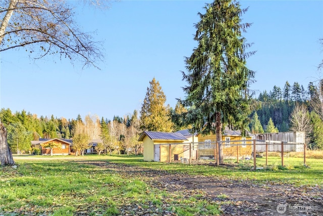 192 Meade Hill Rd, Glenoma, WA 98336 - view of yard featuring a wooded view and fence