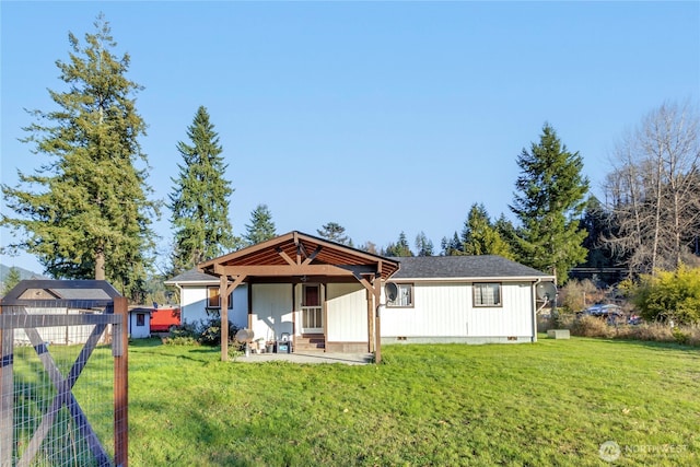 192 Meade Hill Rd, Glenoma, WA 98336 - rear view of house featuring fence, crawl space, and a yard