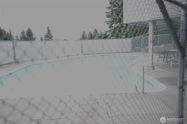 1415 84th St SE Unit 136, Everett, WA 98208 - view of swimming pool featuring fence