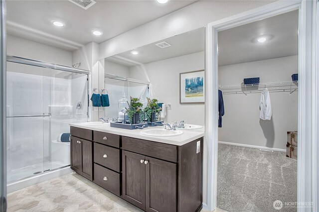 14003 199th Street Ct E, Graham, WA 98338 - bathroom featuring double vanity, a sink, and a shower stall