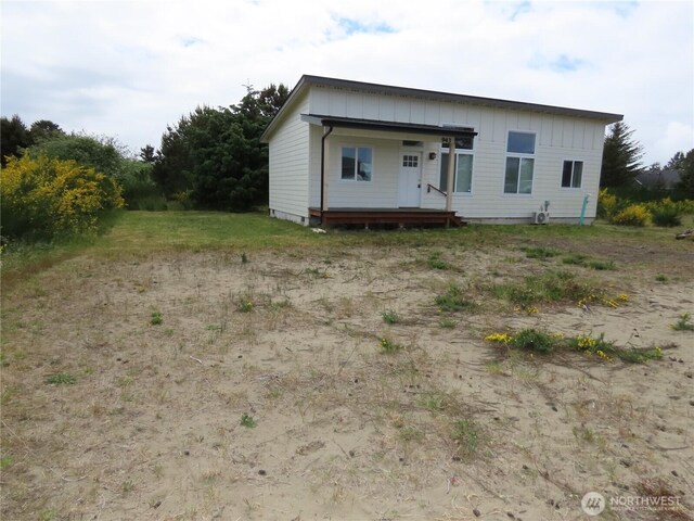 943 Silver King Ave SE, Ocean Shores, WA 98569 - back of house with board and batten siding