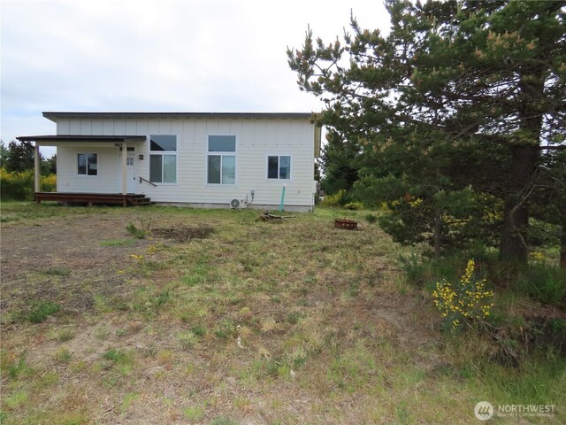 943 Silver King Ave SE, Ocean Shores, WA 98569 - back of property featuring board and batten siding