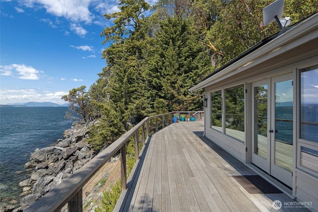 681 Smugglers Cove Rd, Friday Harbor, WA 98250 - wooden terrace featuring a water and mountain view and french doors