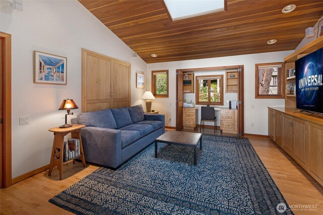 681 Smugglers Cove Rd, Friday Harbor, WA 98250 - living area with light wood-style flooring, baseboards, lofted ceiling, and wooden ceiling