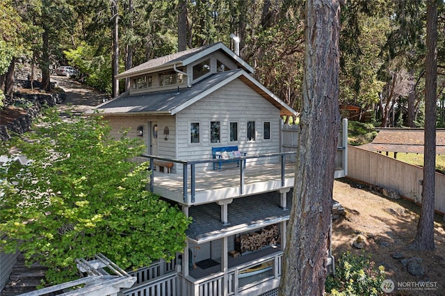 681 Smugglers Cove Rd, Friday Harbor, WA 98250 - exterior space featuring a deck and roof with shingles