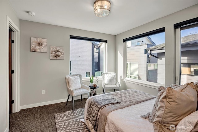 carpeted bedroom with baseboards