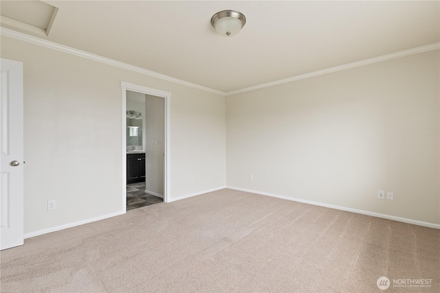 6733 Birdseye Ave NE, Lacey, WA 98516 - carpeted empty room with crown molding, attic access, and baseboards