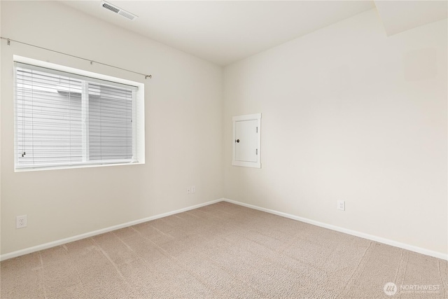 6733 Birdseye Ave NE, Lacey, WA 98516 - spare room featuring visible vents, baseboards, and light colored carpet