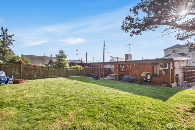 view of yard featuring a fenced backyard