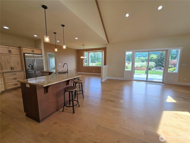 90 Broadmoor St, Sequim, WA 98382 - kitchen featuring stainless steel fridge with ice dispenser, a sink, baseboards, light wood-style flooring, and recessed lighting