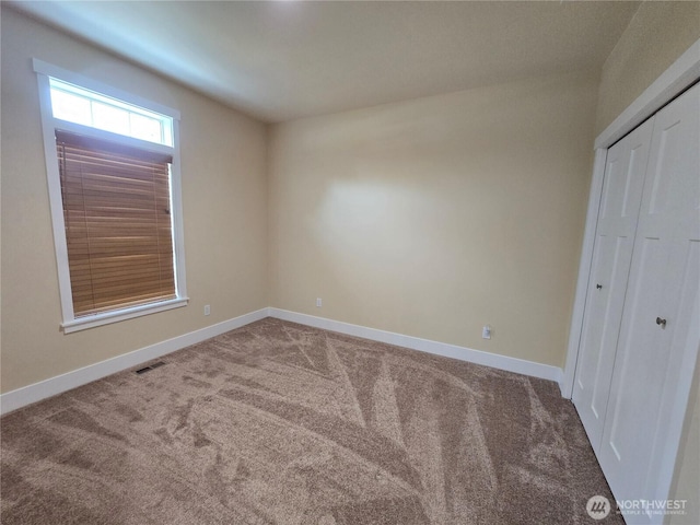 90 Broadmoor St, Sequim, WA 98382 - unfurnished bedroom featuring carpet flooring, baseboards, and a closet