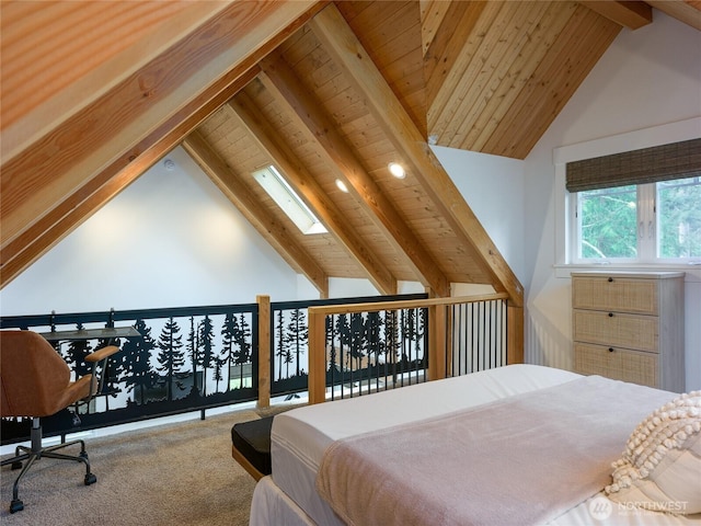 bedroom with carpet floors, high vaulted ceiling, a skylight, and beam ceiling