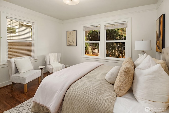 bedroom featuring wood finished floors