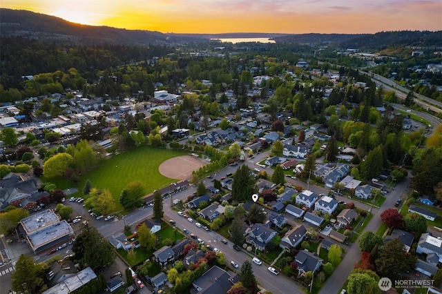 birds eye view of property with a residential view