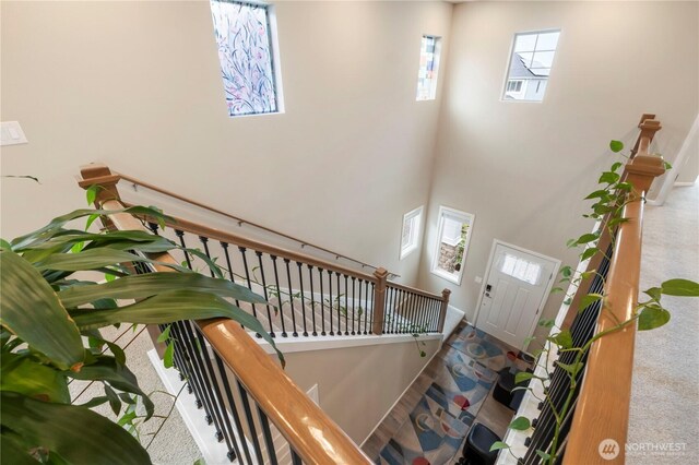 26334 203rd Pl SE, Covington, WA 98042 - carpeted entrance foyer featuring healthy amount of natural light and a high ceiling