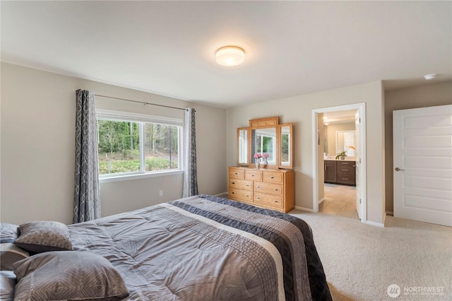 26334 203rd Pl SE, Covington, WA 98042 - bedroom featuring light carpet and ensuite bath