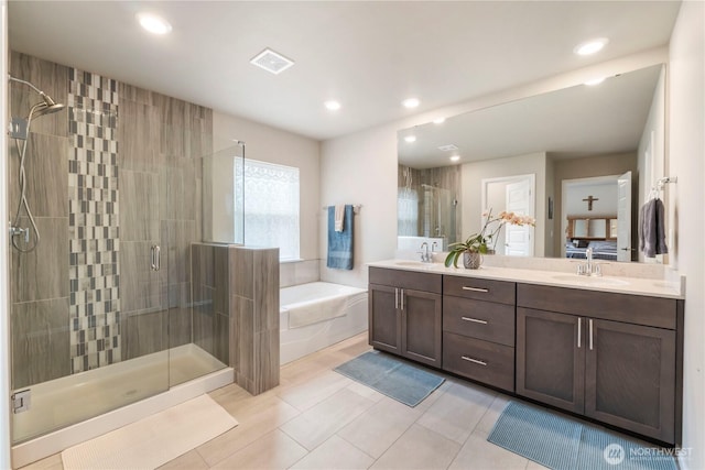 26334 203rd Pl SE, Covington, WA 98042 - full bath with a bath, a stall shower, double vanity, recessed lighting, and tile patterned flooring
