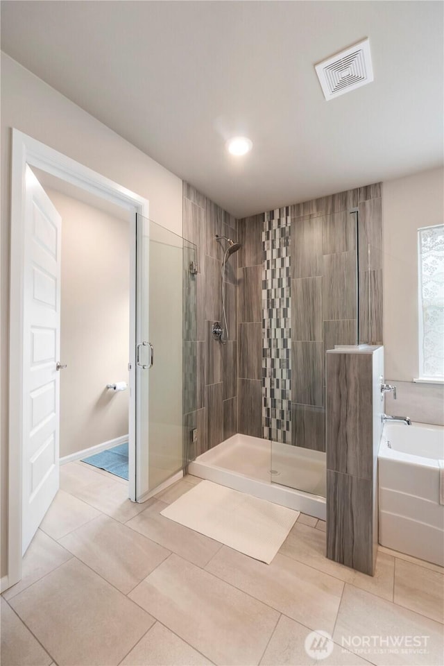 26334 203rd Pl SE, Covington, WA 98042 - bathroom featuring a stall shower, a garden tub, tile patterned floors, and recessed lighting